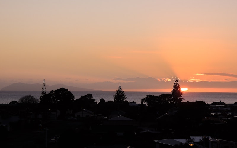 Sunrise over Tuhua/ Mayor Island as seen from the property. 